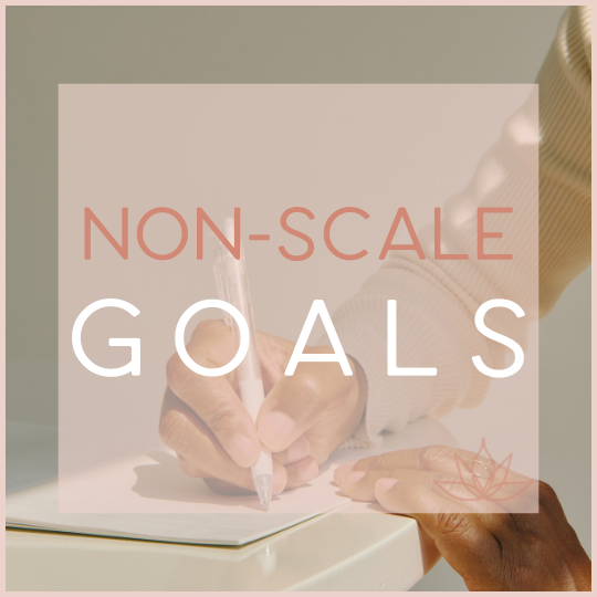 Non-Scale Goals written in text over image of hands using a pen to write in a journal