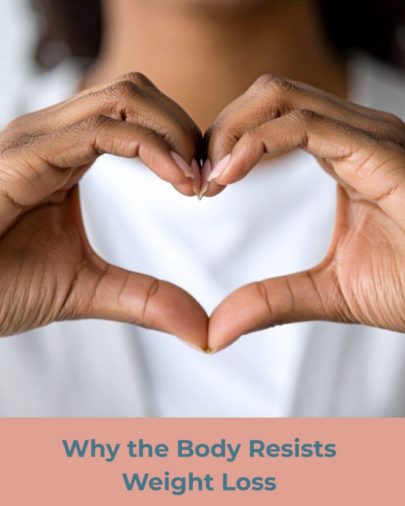 Person forming a heart shape with their hands representing compassion and understanding why the body resists weight loss.
